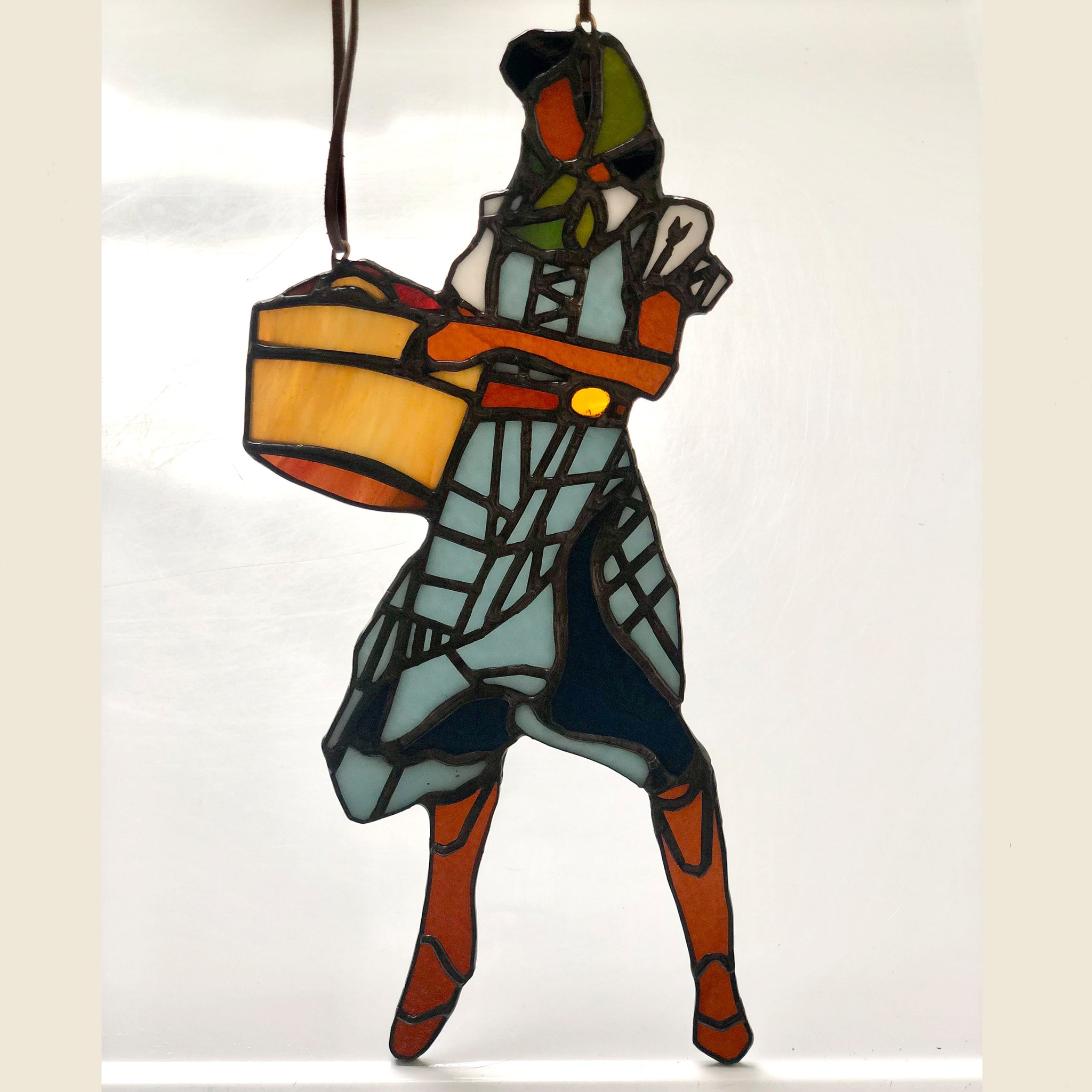 Stained glass artist deals kachina dancer